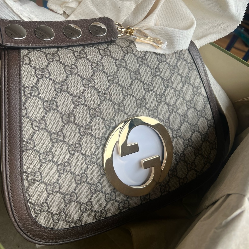Like new Gucci purse. Only worn once. Receipt is in photos. - Picture 1 of 8